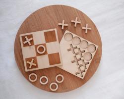 Laser wood cutting used to craft a full wooden tic-tac-toe game