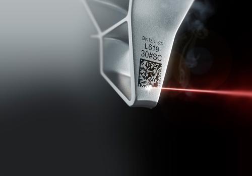 Laser engraving on metal part with Datamatrix code for traceability